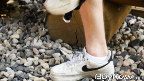 Paul Mason pulls out his dick and jerks it with slick strokes outdoors