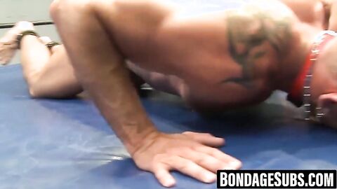 Dominant gay restrains partner up for rough erotic torment