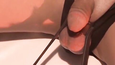 Twink begs for mercy with a ball gag and tight restrictions