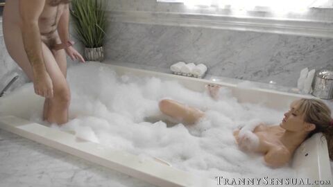 Well hung Joel Someone and busty TS Tori Easton get wet and wild in the tub