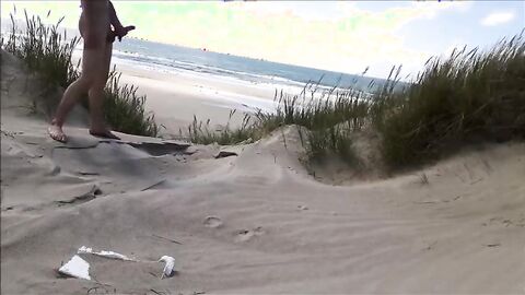 Exhibitionist Strokes Hard on the Beach