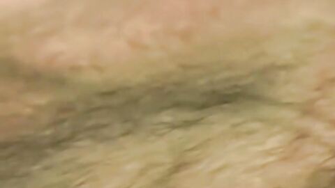 Bigg Pete's neck and mouth strapped in tight leather bondage