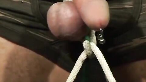 Bigg Pete hands bound and balls roped down to his toes