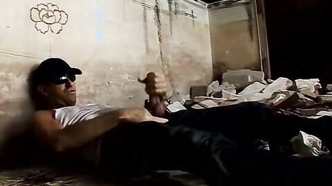 Big dick stud jacks off while pissing on himself