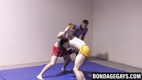 Slim gays spar intensely while stripping naked with hard cocks