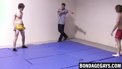 Slim gays spar intensely while stripping naked with hard cocks