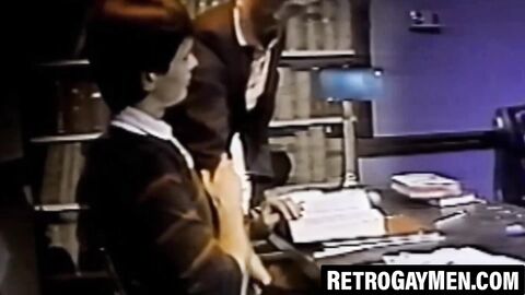 Nerdy students secretly blow each other in the library