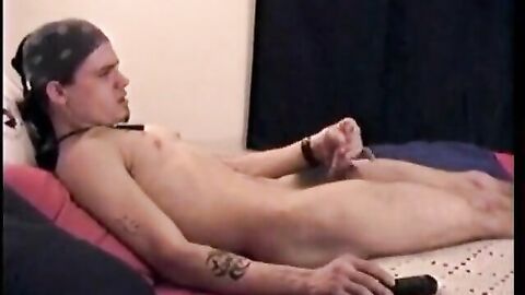 Bandana stud jerks off and cums for the gay producer