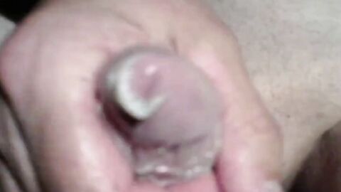 Twink's Webcam Handjob: Small Cock, Big Condom Fun