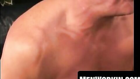 Muscular plumber strokes his stiff fat cock slow