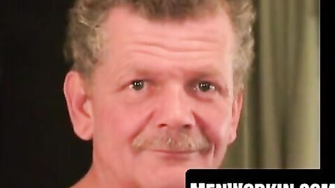 Muscular plumber strokes his stiff fat cock slow