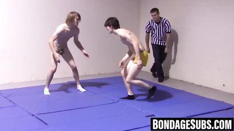 Slim boys wrestle roughly before shedding clothes