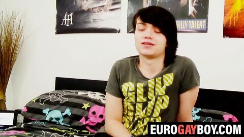 Long haired gay twink strokes his hard dick furiously