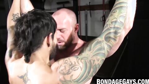 Gym basement echoes with bound hunk's electro torment screams