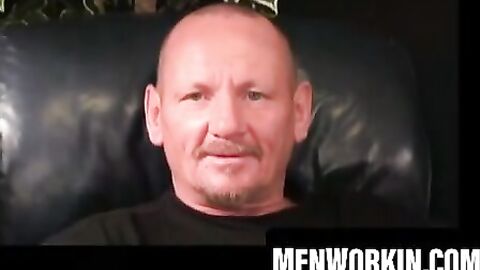 Tattooed mature guy strokes his dick alone