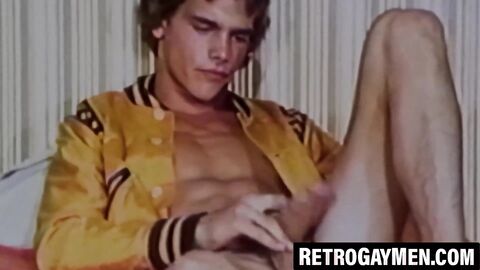 Curly stud Kip Noll strokes his cock with wild intensity