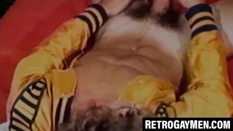 Curly stud Kip Noll strokes his cock with wild intensity