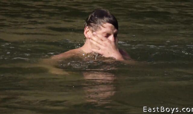 EastBoys.com - Muscled Rick Palmer mitt job outdoors