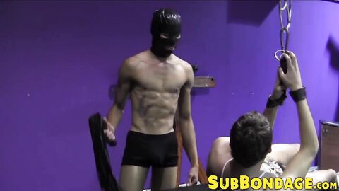 Fit gay with abs who is into BDSM restrained and tormented