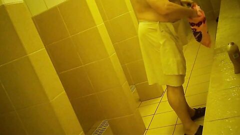 Naked men in public pool shower
