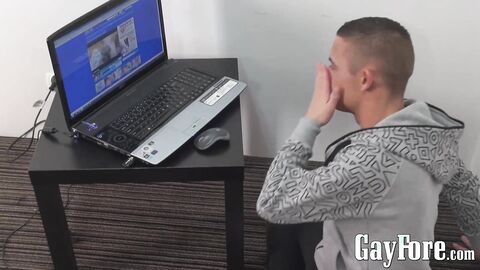 Handsome twink masturbates solo while watching porn