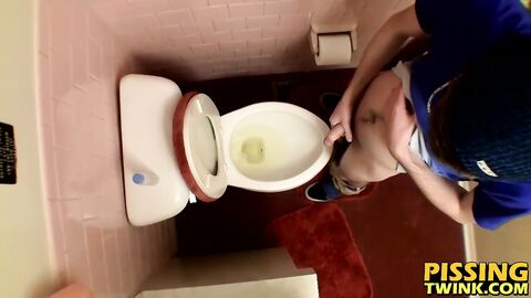 Devin Reynolds grabs his cock and unloads in the toilet|