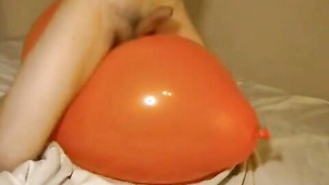 Big inflatable orange balloon humping cum