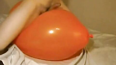 Big inflatable orange balloon humping cum