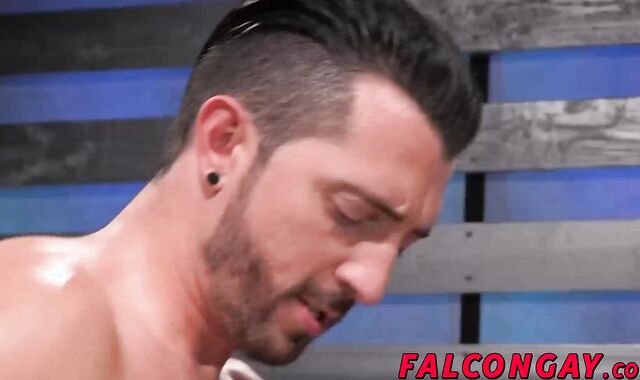 Hot action happening with two big dick hunks at show