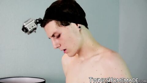 Twink sprayed on his ass after having raw fuck session