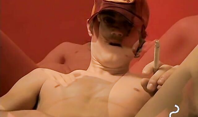 Dark haired Kevin masturbates after pushing dildo in own ass