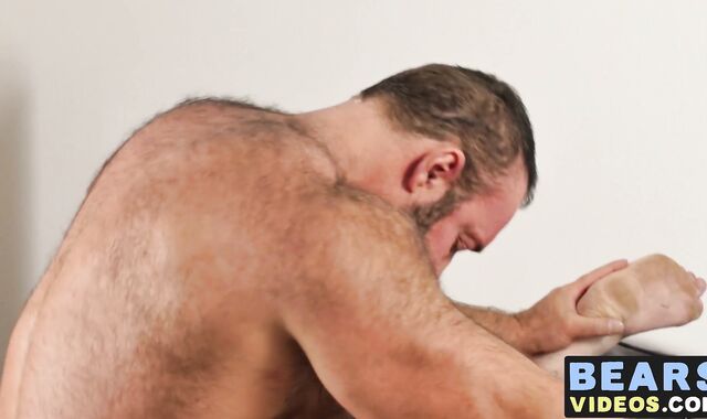 Chubby bear and cub engage in ass fucking spitroast session