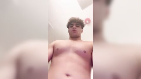 Sexy athlete jerks in shower