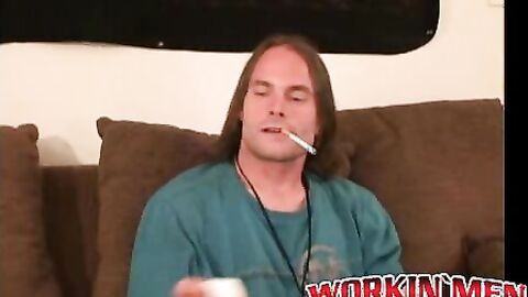 Long haired homosexual smokes a cigar before jerking off