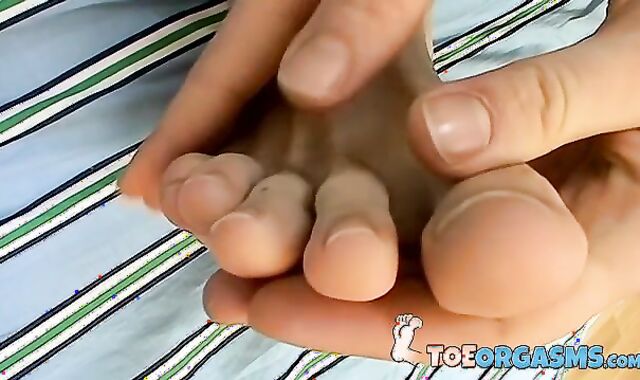 Foot worshiping twink cums on his feet after masturbation