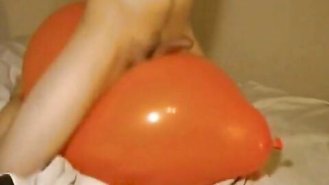 Big inflatable orange balloon humping cum