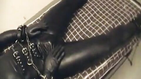 Rubberboy in Bondage for the night