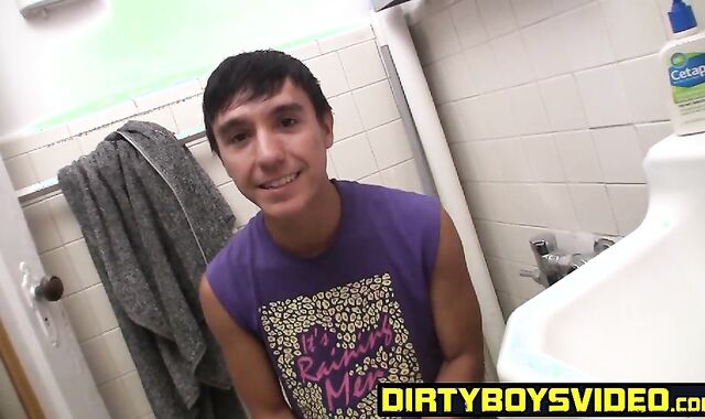 Hunky latino twink Nick strokes it in the bathroom solo