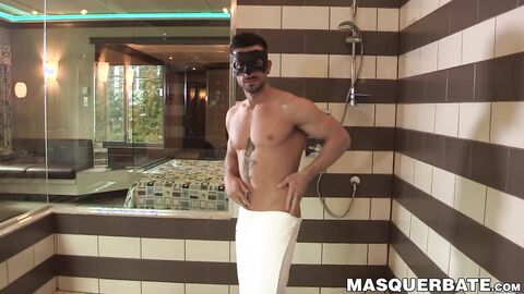 Masked ripped guy shows of enormous cock during shower