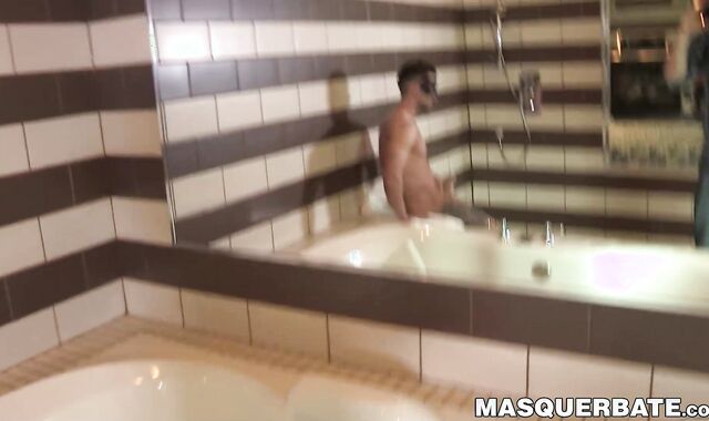 Masked ripped guy shows of enormous cock during shower