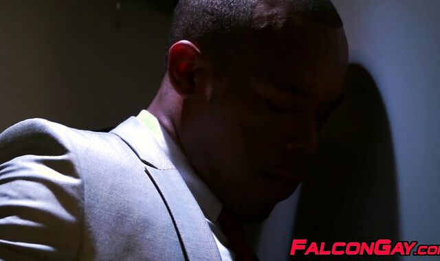 Two horny guys blowing each others dicks through glory hole