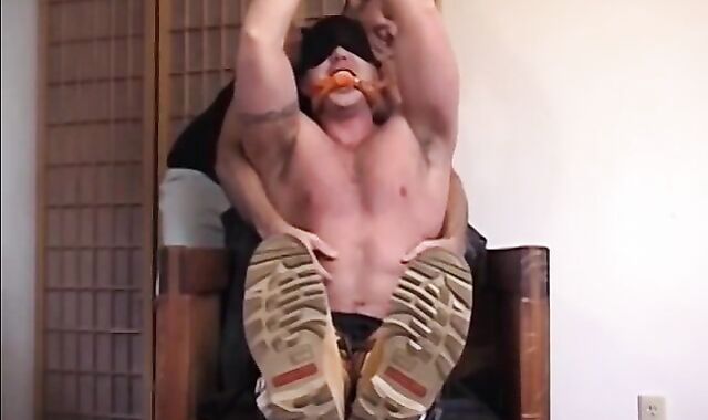 Cute muscular Randy with big dick gets feet tickled hard