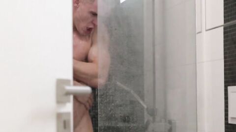 Big dicked jock takes a shower before taking a stroke