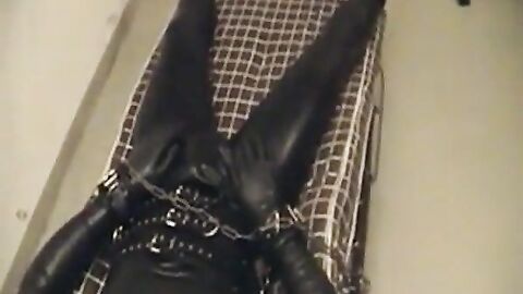 Rubberboy in Bondage for the night