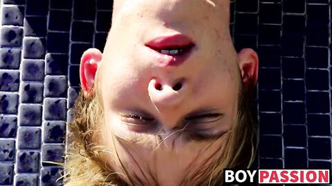 Blonde twink Tyler Thayer jerking his cock near the pool