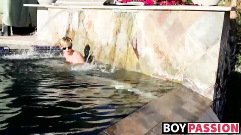 Blonde twink Tyler Thayer jerking his cock near the pool