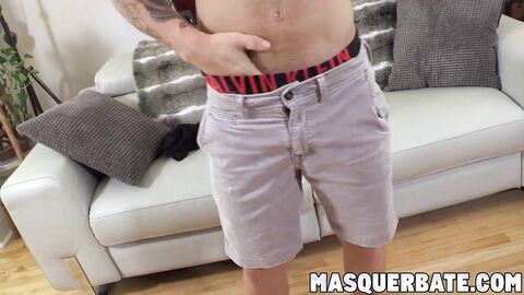 Good looking jock with tattoos jacks off his hard dick