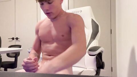 Handsome boy jerking off and cumming