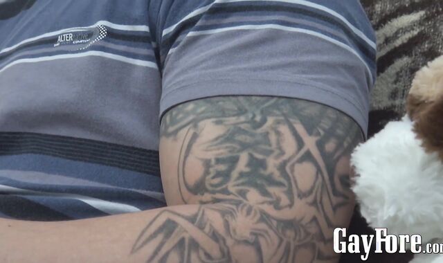 Handsome jock Cal plays with his foreskin while jerking off