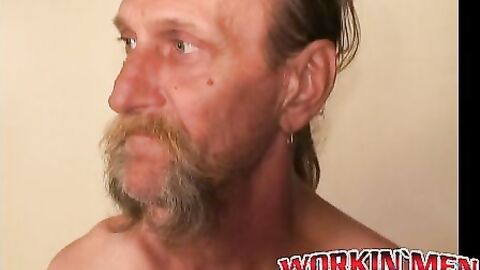 Bearded mature homo jerks off his big dick and comes hard